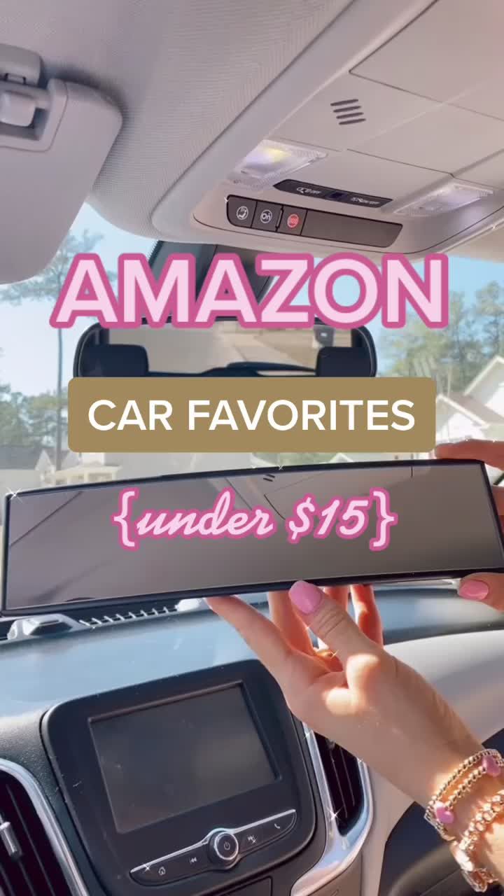 a person holding up a car sign in the back of a car with text over it that reads, amazon car favorites under $ 75