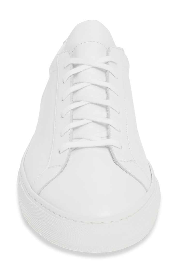 A streamlined, classic sneaker that doesn't shout, this Italian-leather walkabout features monochromatic coloring that keeps it as low-key as it is luxe. Style Name:Common Projects Original Achilles Sneaker (Men). Style Number: 5636676. Classic Low-top Sneakers With Contrast Sole, Classic White Low-top Sneakers, Classic White Sneakers With Vulcanized Sole, Classic Sneakers With Rubber Sole And Plain Toe, Classic High-top Sneakers, Classic White Everyday Sneakers, Classic High-top Custom Sneakers With Perforated Toe Box, Classic High-top Custom Sneakers With Perforated Toe, Classic Everyday Custom Sneakers With Contrast Sole