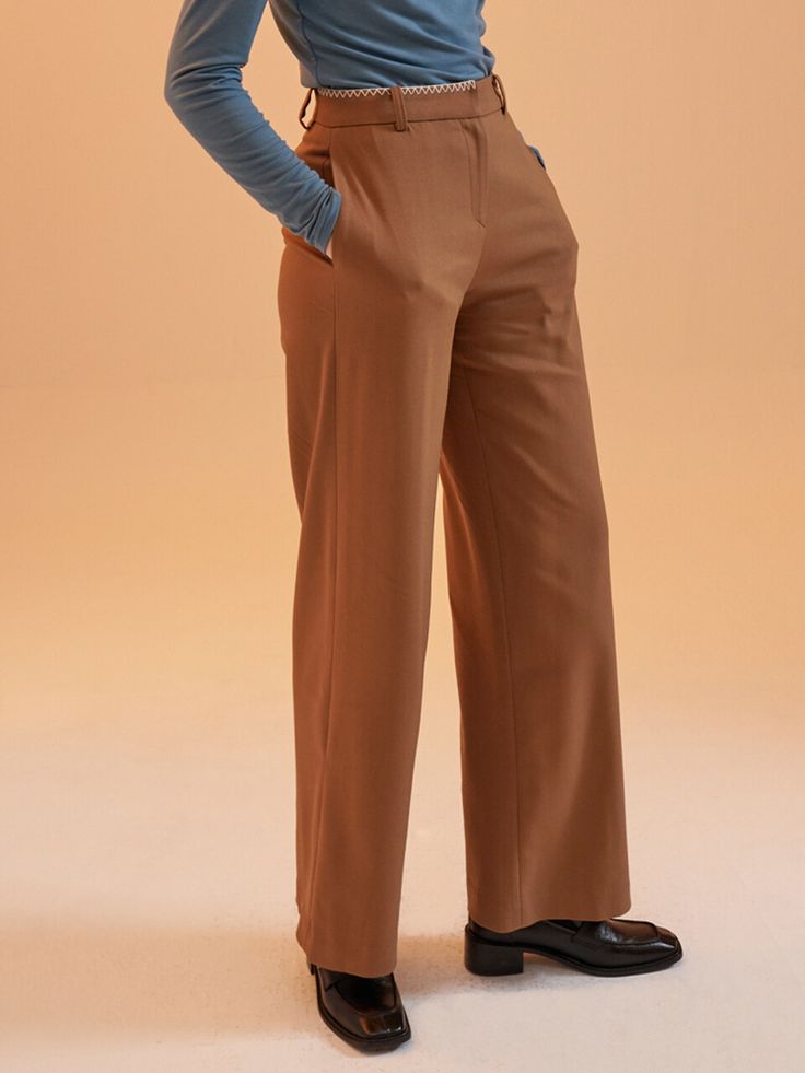 Editor's notesThis wide pants is classic and wide fit, so you can style it for various looks. The blanket stitch is exclusive 1159 STUIO's detail point with casual and kitschy mood. Fleeced lining will help you to keep warm.- Wide leg trousers- Fleeced lining- Blanket stitch point at a part of waist band- Side pocketsMeasurements (in.)One Size(XS-M)- Total Length : 42.6in- Waist : 28.6in- Hip     37.5in- Front rise     11.9in- Back rise     13.8in.* Model info : 5' 8.5 / Bust : 32.67 in / Waist : 23.62 in / Hips : 35.82 in  Composition & Care- 23% Polyester, 74% Rayon, 3% Spandex- Dry cleaningDesigner- by 1159STUDIOS Fall Wide Leg Work Pants With Welt Pockets, Tailored Straight Leg Work Pants For Fall, Brown Pressed Crease Office Bottoms, Straight Hem Bottoms For Office In Fall, Tailored Brown Pants With Straight Hem, Brown Tailored Pants With Straight Hem, Fall Office Pants With Straight Hem, Fall Wide Leg Pants For Office With Straight Hem, Fall Wide Leg Pants For Office