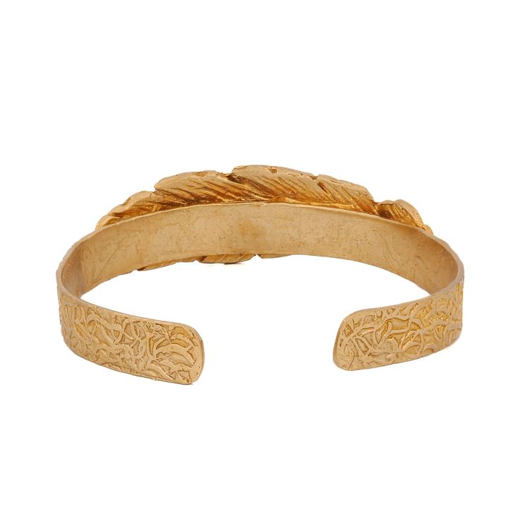 Cleopatra Leaf Gold Cuff Bracelet ; Expertly crafted from high-quality brass, this piece boasts a durable construction that forms the perfect canvas for the luxurious 24k gold plating. The result is a brilliant finish that radiates warmth and richness, suitable for any occasion that calls for a touch of glamour. The bracelet features an intricate leaf design, meticulously shaped and detailed to mirror the delicate veins and contours of a natural leaf. This botanical motif symbolizes growth and r Ceremonial Adjustable Gold Cuff Bracelet, Luxury Brass Bangle, Ceremonial Adjustable Yellow Gold Cuff Bracelet, Ceremonial Gold Brass Cuff Bracelet, Adjustable Yellow Gold Cuff Bracelet For Ceremonial Occasions, Adjustable Yellow Gold Cuff Bracelet For Ceremonial Wear, Adjustable Yellow Gold Cuff Bracelet For Ceremonies, Adjustable Luxury Brass Bangle, Luxury Adjustable Brass Bangle