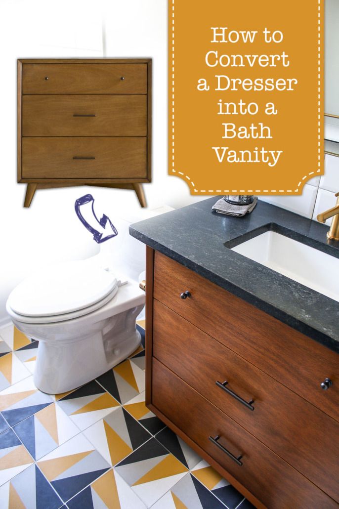 a bathroom with a sink, toilet and vanity in it's own area is shown