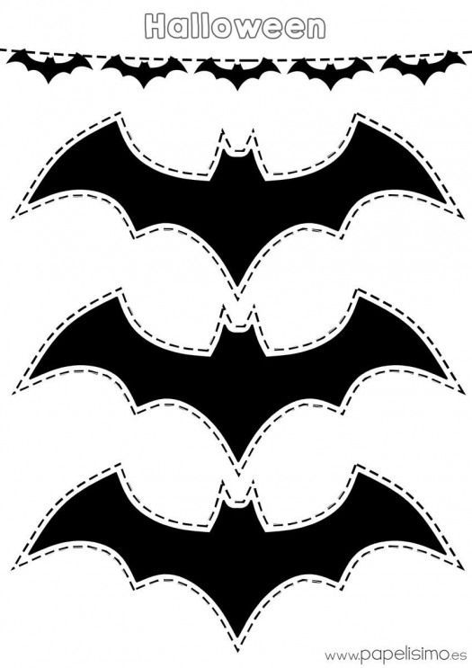 a bat cut out with the word halloween on it's front and back side