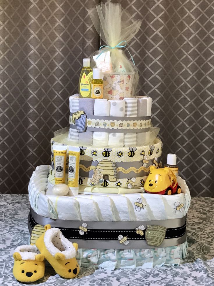 a diaper cake with baby items on it