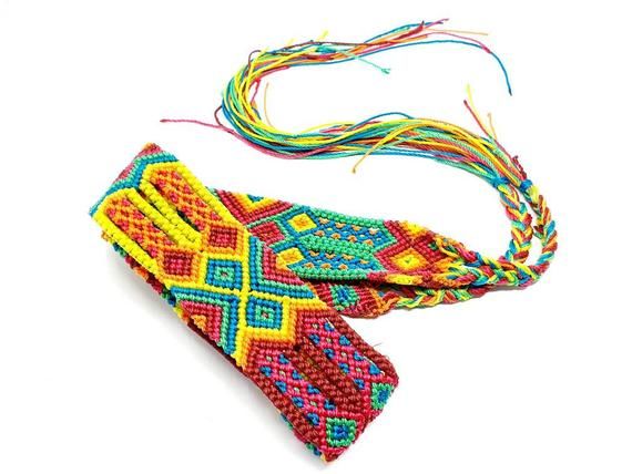 I love Mexico celebrates the native crafts of Mexico and the artists that produce them, enabling them and their communities to get recognized for their talented work and achieve economic stability for their families. This listing is for one piece of this beautiful handmade multi coloured belt/strap. Multicolor Bohemian Belt For Festivals, Folk Style Multicolor Embroidered Belt, Folk Multicolor Embroidered Belt, Adjustable Artisan Multicolor Belt, Handmade Multicolor Belt For Festivals, Handmade Multicolor Belts For Festival, Traditional Handmade Multicolor Belts, Hippie Handwoven Multicolor Friendship Bracelets, Adjustable Handmade Multicolor Belt