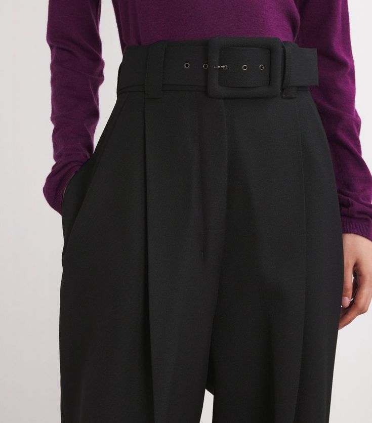 Find MAX MARA Virgin Wool Belted Trousers on Editorialist. Cinched at the waist to make a statement, these Max Mara trousers are pleated to create full-volume and a wide-leg silhouette that flatters. The neutral colour works perfectly with whatever blouse or top you fancy. Black Pleated Wide Leg Pants For Work, Evening Wide Leg Belted Bottoms, Wide Leg Pants With Belt For Work, Black Belted High Waist Wide Leg Pants, Modern Black Wide Leg Pants With Belt Loops, Elegant Tapered Leg Bottoms With Belt Detail, Modern Black Belted Bottoms, Chic Black Belted Wide Leg Pants, Elegant Tapered Leg Pants With Belt