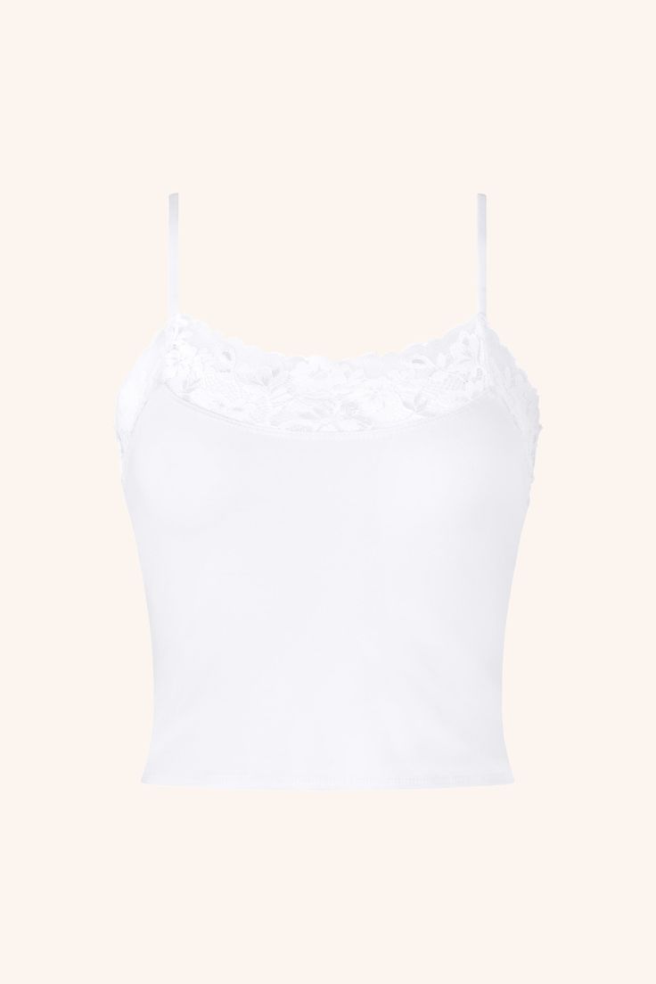 Meet our Cozy cami: your ultimate blend of comfort and chic. This waist-length, body-fitted cami is ultra-soft and features a delicate lace trim that adds a touch of femininity. Perfect for layering or wearing solo, it transitions smoothly from day to night. Snug yet breathable, it's the stylish staple you'll reach for again and again. Elevate your wardrobe with this versatile must-have. Curve hugging Cropped look Floral lace scallop detailing Straight neckline Composition: Viscose Spandex Nylon Lace Cami Top, Straight Neckline, Lace Cami, Waist Length, Cami Top, Body Fit, Cami Tops, Model Measurements, Floral Lace