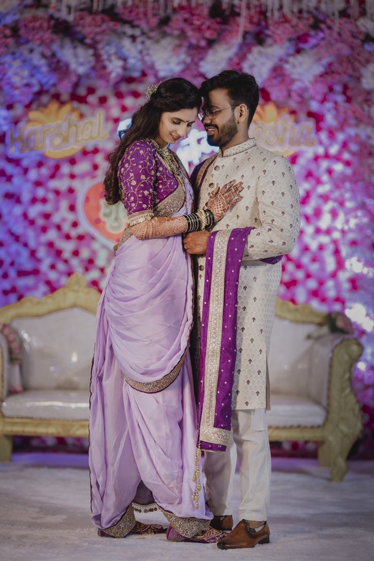 a man and woman standing next to each other