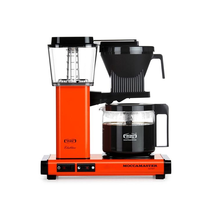 an orange coffee maker sitting on top of a counter