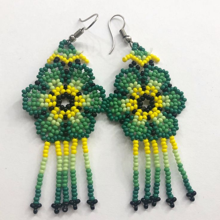 Hand Made Great Quality Green Flower Earrings Includes Silicon Earring Back Green Flower-shaped Earrings For Summer, Casual Handmade Yellow Earrings, Casual Green Flower Shaped Jewelry, Casual Green Flower Jewelry, Casual Yellow Drop Earrings, Handmade Green Flower Shaped Earrings, Handmade Yellow Flower Beaded Earrings, Handmade Green Flower-shaped Earrings, Yellow Beaded Flower Earrings