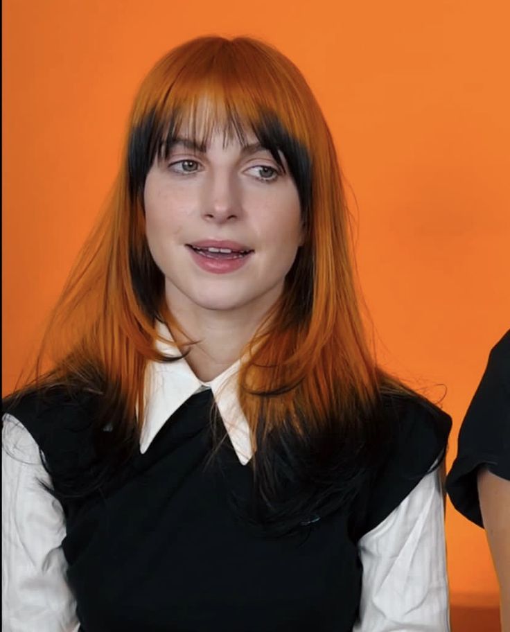 Ginger With Black Tips, Hayley Williams Hair 2023, Orange Hair With Black Tips, Orange Hair Black Tips, Orange Roots Black Hair, Foxy Hair Color, Ginger Hair With Black Tips, Orange Hair Pale Skin, Black And Ginger Hair