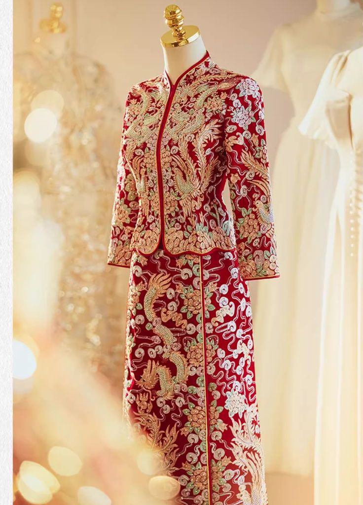 a red and white dress on display in a room