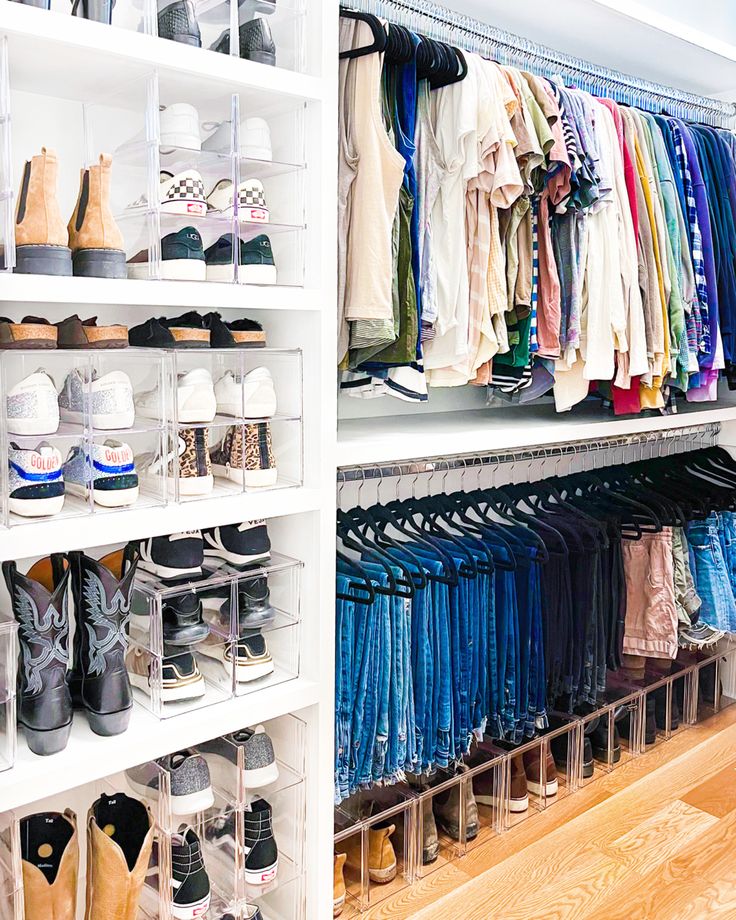 a closet filled with lots of clothes and shoes