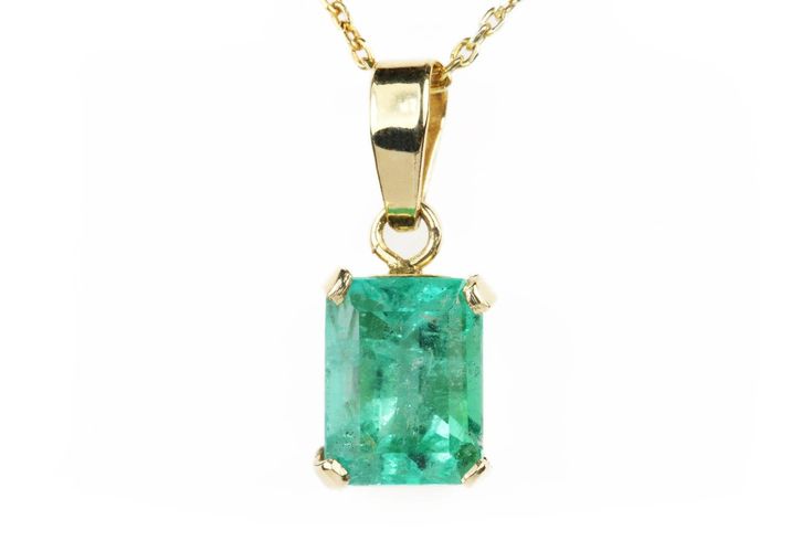 Featured here is a stunning emerald cut Colombian emerald necklace in fine 14K yellow gold. Displayed in the center is a medium-green emerald with very good clarity, accented by a simple four-prong gold mount, allowing for the emerald to be shown in full view. The earth mined, Colombian emerald has a nice green color with excellent qualities. An 18-inch gold chain will be provided with this beautiful pendant! This necklace is ideal for everyday use and is the perfect accessory to any outfit. The 14k Gold Emerald Cut Emerald Necklace, Rectangular Emerald Fine Jewelry Necklace, Rectangular Emerald Necklace Fine Jewelry, Rectangular Emerald Gemstone Necklace, Rectangular Emerald Necklace In Fine Jewelry Style, Gold Emerald Cut Emerald Necklace, Elegant Emerald Cut Emerald Necklace In Yellow Gold, Elegant Yellow Gold Emerald Cut Emerald Necklace, 14k Gold Emerald Cut Gemstone Necklace