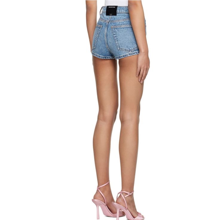 Nwt Alexander Wang Blue Hot Denim Shorts. Stretch Cotton/Lyocell-Blend With Fading & Whiskering Throughout. High-Rise Fit/Belt Loops & Zip-Fly With Logo Patch At Back Waistband. Size 23. Fits A Small/Small Best. Fitted High Rise Light Wash Shorts, Spring Bottoms In Medium Wash With Short Legs, Fitted High Rise Light Wash Jean Shorts, Chic High Rise Summer Bottoms, Chic High Rise Bottoms For Summer, Chic Blue Jeans With Short Length, Chic Light Wash Short Length Bottoms, Chic Short Length Blue Jeans, Light Wash Fitted Bottoms With Short Leg