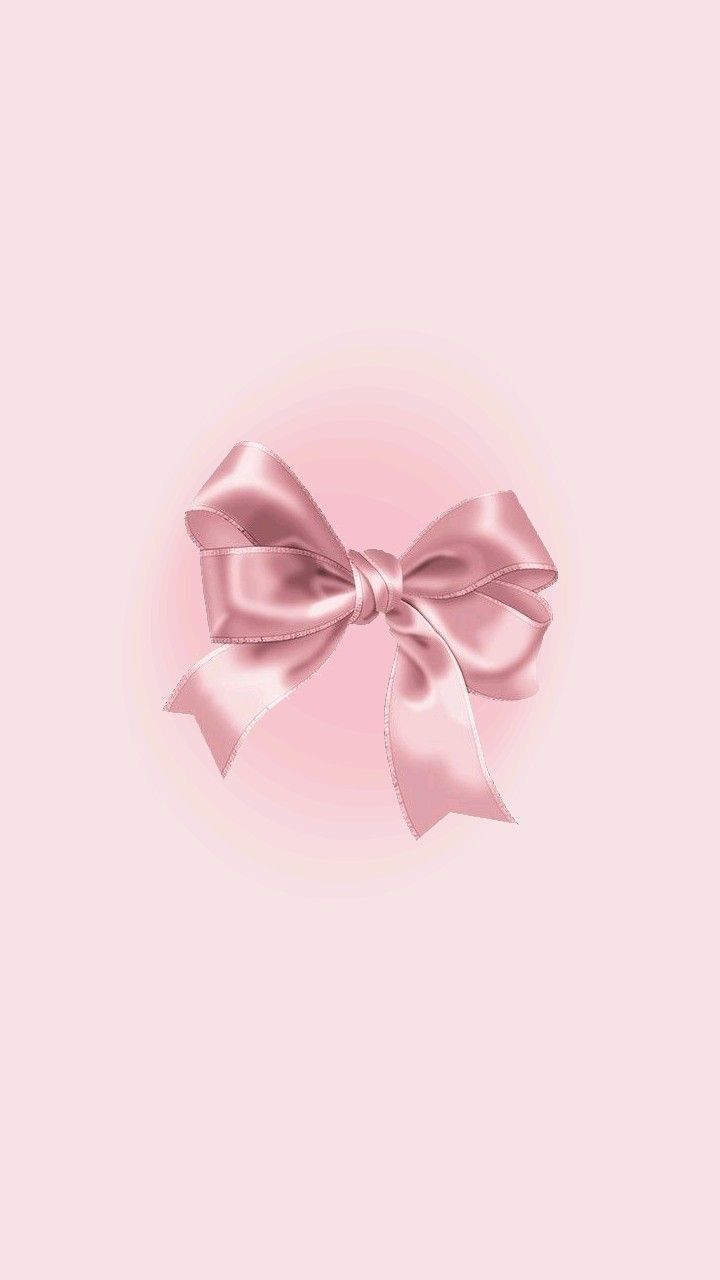 a pink background with a large bow on the top and bottom part of it's ribbon