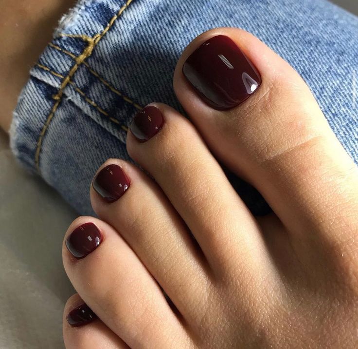 20 Latest Burgundy Pedicure Designs To Try In 2024! 16 Deep Red Pedicure, Maroon Toe Nails, Pedicure 2024 Trends, Maroon Pedicure, Round Toe Nails, Dark Red Toe Nails, Dark Red Pedicure, Burgundy Toe Nails, Burgundy Toes