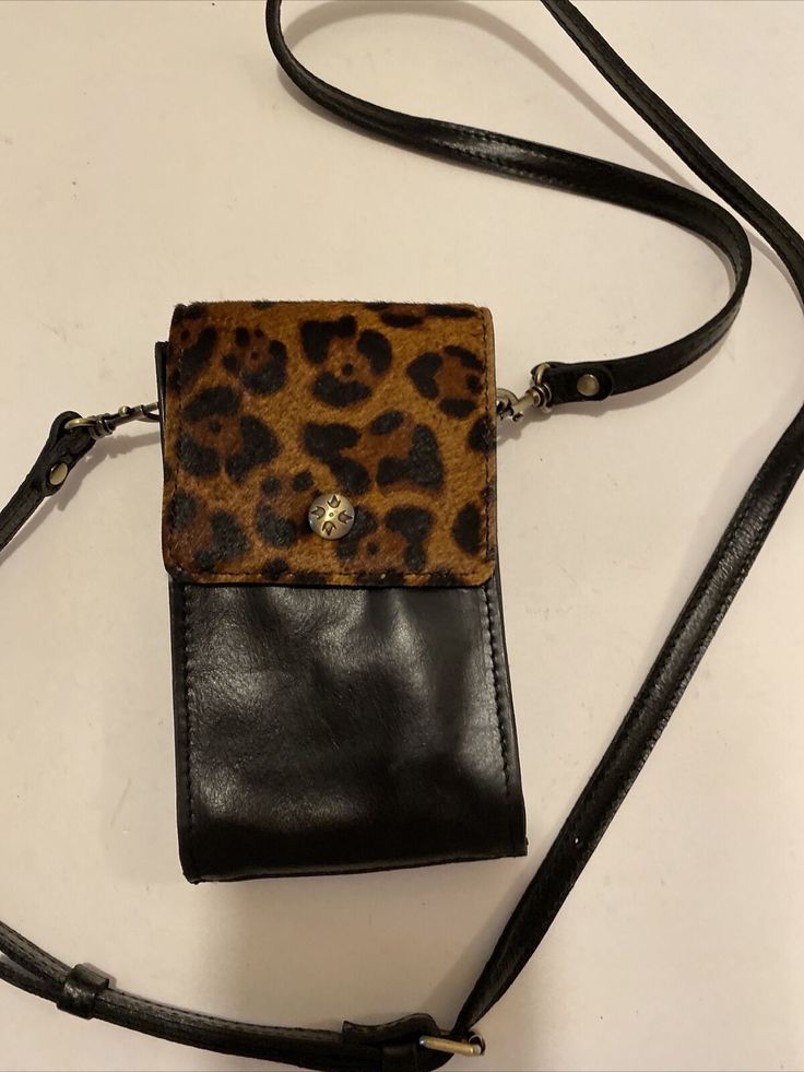 Patricia Nash Brown Leopard Crossbody Bag Leather phone purse New. Condition is "New without tags". Shipped with USPS Priority Mail. fits a phone, mask, lipstick and money.  All you need. Super cute and nicely made.  I just have too many items in my collection and need to move some along to new homes. I bought this from HSN myself and never carried. Trendy Phone Bag With Hidden Sleeve For On-the-go, Brown Phone Bag With Cell Phone Pocket For On-the-go, Trendy Portable Rectangular Phone Bag, Handheld Phone Bag With Detachable Strap For On-the-go, Handheld Phone Bag With Detachable Strap, Handheld Phone Bag With Detachable Strap For Travel, Trendy Wallet With Mobile Phone Bag, Rectangular Phone Bag For Everyday Use, Daily Use Phone Pouch Bag With Adjustable Strap