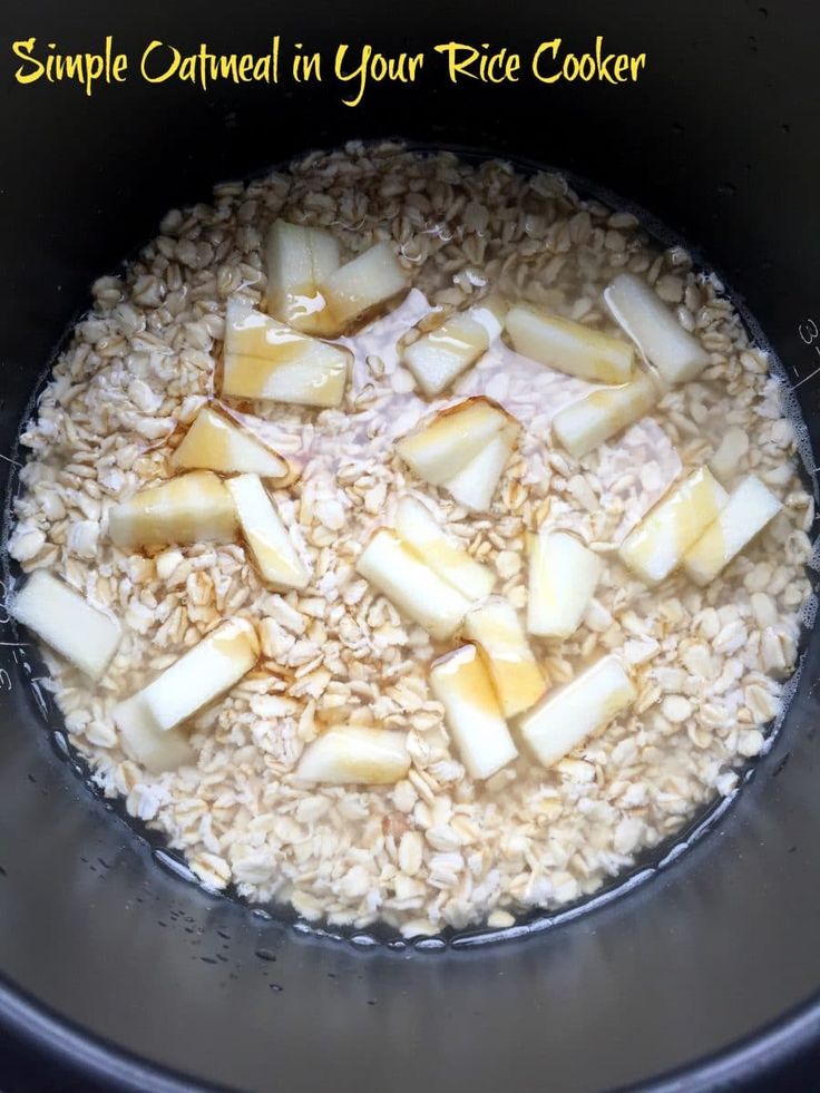 the food is being cooked in the pot with rice and other things to make it look delicious