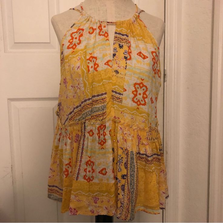 New! Yellow Printed Blouse With Tie Back. Baby Doll Style. Very Pretty For Spring And Summer. Multicolor Tank Blouse For Spring, Yellow Tank Top For Vacation In Spring, Yellow Tank Top For Vacation And Spring, Bohemian Sleeveless Tops For Day Out, Yellow Sleeveless Summer Tops, Yellow Tank Top For Spring Vacation, Vacation Multicolor Tank Blouse, Yellow Sleeveless Blouse For The Beach, Yellow Bohemian Tops For Vacation