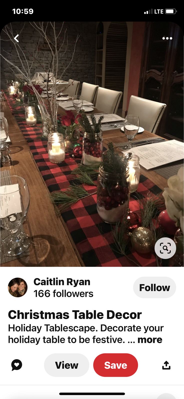 the table is set with candles and christmas decorations