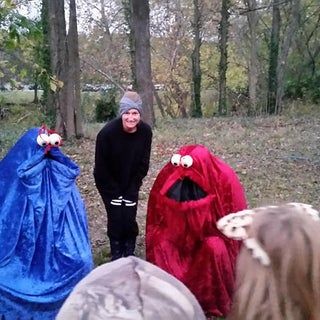 a group of people dressed up in costumes