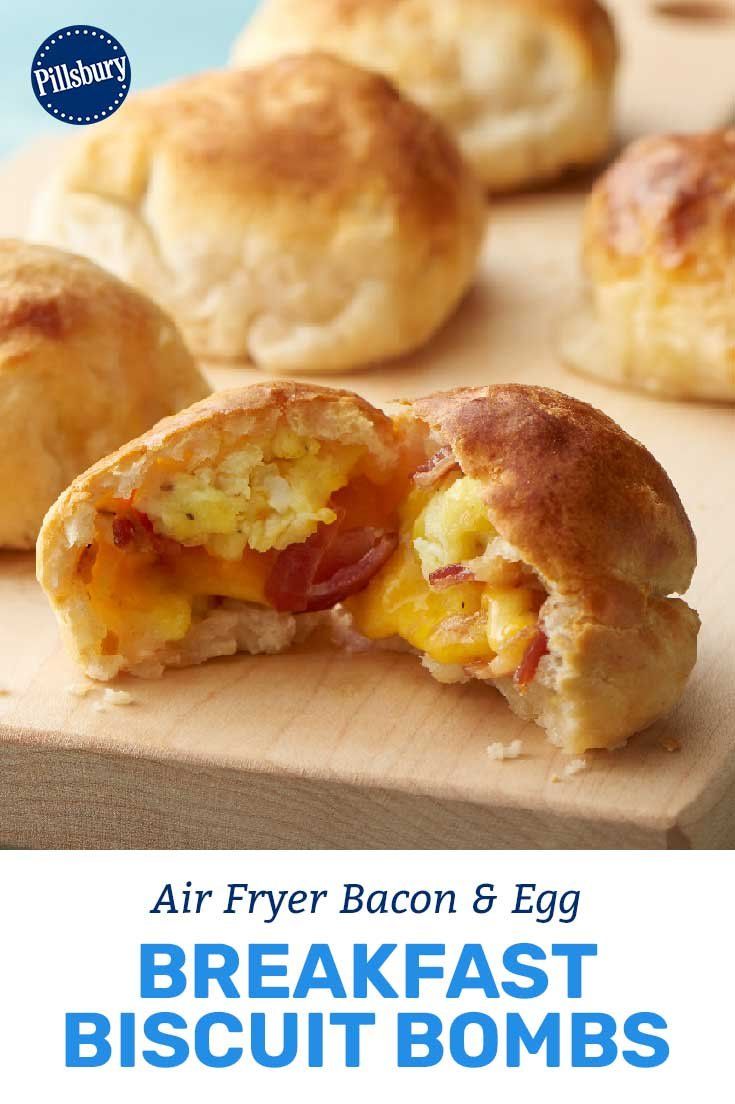 breakfast biscuits on a cutting board with the words air fryer bacon and egg