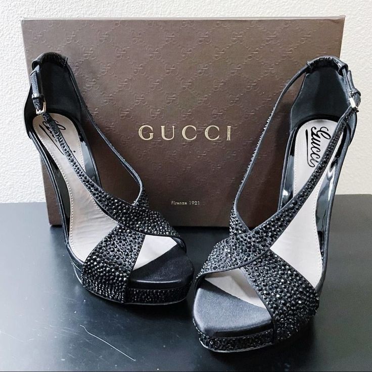 Authentic Gucci Elegant "Sofia Etoile" Size: 38 Brand New Never Worn Only Tried On Includes Gucci Box & Gucci Dust Bag Originally $1,195 + Tax!! These Beautiful Gucci Strappy Sandals Are Beautifully Designed To Pair With Any Of Your Party & Evening Looks Authentic Gucci Elegant "Sofia Etoile" In Dramatic Black Patent Leather, Suede & Satin Encrusted W/ Black Shimmering Crystals Criss-Cross Stiletto Heels Rounded Toe Buckled Ankle Strap Closed Heel 5 1/4" High Stiletto Heel & 1.5" Platform See Ph Designer Embellished Heels With Ankle Strap, Designer Embellished Ankle Strap Heels, Luxury Embellished High Heels, Luxury Rhinestone Heels For Gala, Luxury Rhinestone Heels For Cocktail, Luxury Cocktail Heels With Rhinestones, Luxury Heels With Rhinestones For Formal Occasions, Luxury Gucci Heels For Gala, Glamorous Embellished Formal Heels