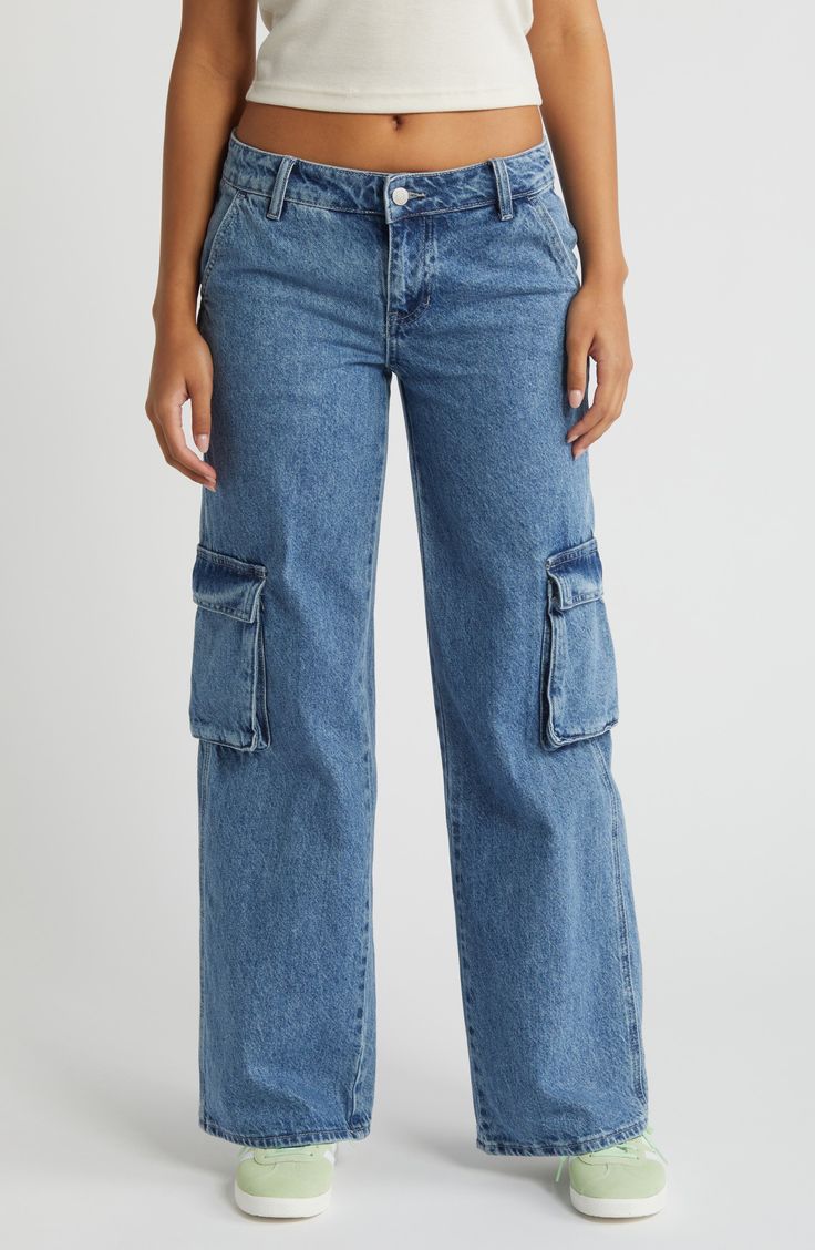 Side cargo pockets give you ample space on these faded wide-leg jeans that give you definite retro vibes. 29 1/2" inseam; 24" leg opening; 10" front rise; 14 1/2" back rise (size 29) Zip fly with button closure Side cargo pockets 100% cotton Machine wash, tumble dry Imported Medium Wash Relaxed Fit Utility Flare Jeans, Utility Relaxed Fit Medium Wash Flare Jeans, Utility Style Medium Wash Relaxed Fit Flare Jeans, Utility Style Wide Leg Flare Jeans With Patch Pockets, Medium Wash Wide Leg Cargo Jeans With Patch Pockets, Medium Wash Wide Leg Utility Cargo Pants, Utility Wide Leg Medium Wash Cargo Pants, Medium Wash Wide Leg Utility Flare Jeans, Light Wash Utility Flare Jeans