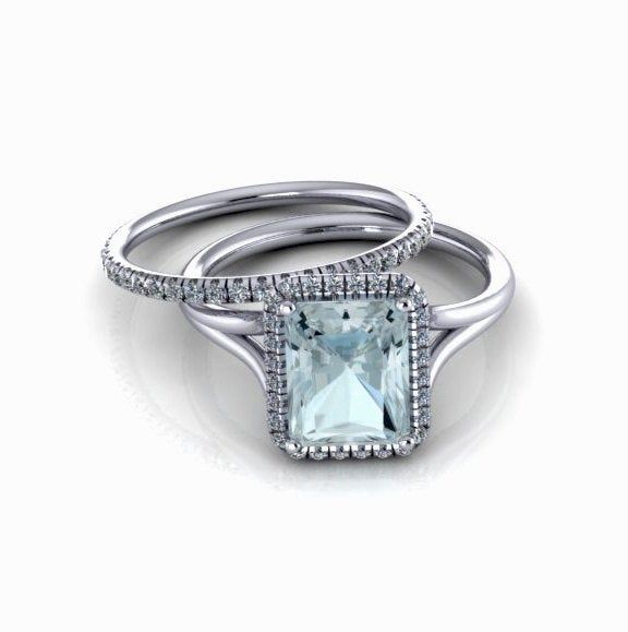 Aquamarine Engagement Ring 14K White Gold Diamond Halo Engagement Ring Emerald Cut Wedding Ring We are happy to introduce this new ring as a part of our up-scale series! This 14K White Gold ring could be perfect as an Engagement ring or simply an adorable ring you can wear every day. Center stone is genuine emerald cut Aquamarine light beautiful blue color, really clear, about 2.5ct. (9x7mm) There is a delicate White Diamonds halo surrounding the Aqua and an elegant split shank. The gallery unde Emerald Cut Wedding Ring, Aquamarine Engagement Ring White Gold, Halo Engagement Ring Emerald, Wedding Rings Emerald Cut, Engagement Ring Emerald Cut, Engagement Ring Emerald, Aquamarine Engagement Ring, Emerald Engagement Ring Cut, Aquamarine Jewelry