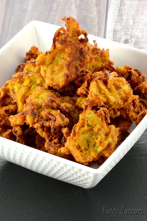 some fried food in a white bowl on a table