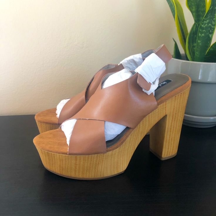 Brand New. Never Been Worn. Pu Leather/Suede. Platform Heel. Suede Mules With Wrapped Heel And Round Toe, Spring Open Toe Clogs With Stacked Heel, Spring Ankle Strap Clogs With Stacked Heel, Spring Clogs With Padded Heel, Medium Width, Spring Clogs With Padded Heel And Medium Width, Brown Suede Sandals With Wrapped Heel, Spring Suede Clogs With Wedge Heel, Spring Suede Wedge Heel Clogs, Spring Leather Clogs With Wrapped Heel