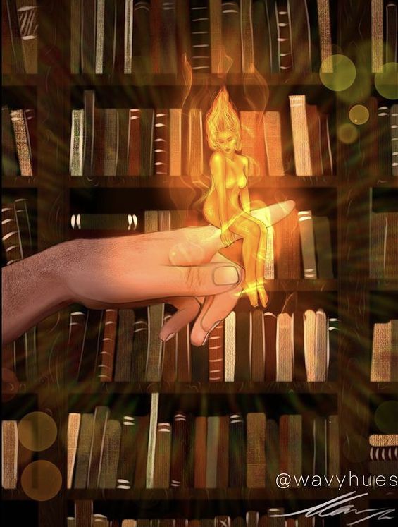 a person holding a lit candle in front of a book shelf filled with lots of books