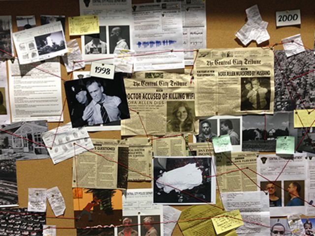 a bulletin board covered in papers and pictures