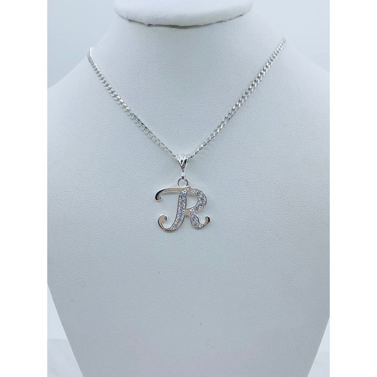 925 Sterling Silver Necklace With Initial R, G, S, Or E Women’s Or Girls Necklace Available In 16" Or 18” In Length And 2.5mm Wide And Pendant White Cubic Zirconia Includes A Small Box Check Out My Other Jewelry ************ Cadena De Mujer O Nia En De Plata Con Inicial Cadena Disponible 16 O 18 Pulgadas De Larga Y 2.5 Milmetros De Ancho Dije Letra R Mide Aproximadamente 14 Milmetros Piedra Zirconia Blanca Sku 4422 Sterling Silver Hallmarked Initial Necklace For Anniversary, White Gold Sterling Silver Initial Pendant Necklace, Silver Sterling Silver Initial Pendant Charm Necklaces, Silver Sterling Charm Necklace With Initial Pendant, Elegant Silver Initial Pendant Charm Necklace, Silver Initials Pendant Necklace, Sterling Silver White Gold Initial Necklace, Silver Hallmarked Name Necklace For Anniversary, Classic Silver Hallmarked Charm Necklaces