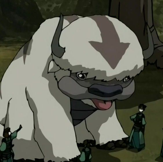 an animated image of a giant white animal with horns on it's head and two people standing in the background