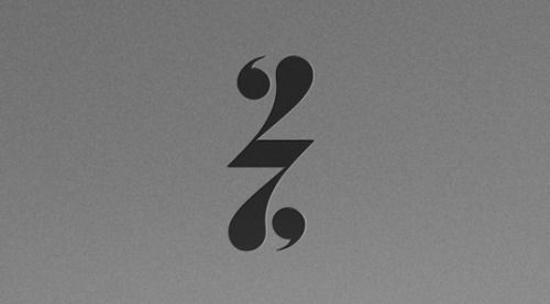 the number two is written in black on a gray background with an airplane flying overhead