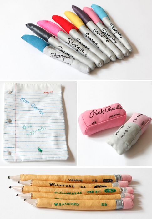 four different types of crayons and some writing on paper next to each other