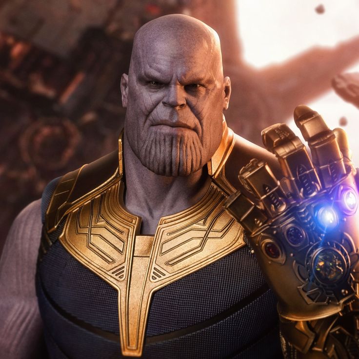 an image of thanos from the movie avengers 2 holding his hand up in front of him