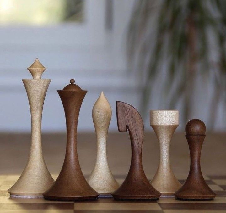 the chess pieces are made out of wood