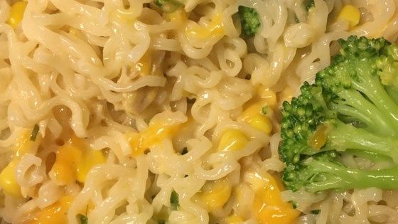 broccoli and noodles are mixed together in a bowl