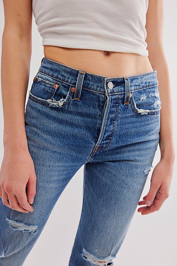 **See above for the Levi’s size chart to find your best fit.** **Fit:** May run small, we recommend sizing up. In Levi’s authentic rigid denim, these high-rise jeans are fitted through the hips and thighs. * Cropped length with a frayed hem * Button fly * Five-pocket style | Levi's Wedgie Straight Jeans at Free People in Medium Wash, Size: 26 Fitted Distressed Jeans For Everyday Wear, Everyday Fitted Distressed Jeans, Fitted Cutoff Jeans With Five Pockets, Fitted Cutoff Everyday Jeans, Classic Fitted Cutoff Jeans, Fitted Dark Wash Cutoff Jeans, Fitted Cutoff Rigid Denim Jeans, Classic Fitted Distressed Jeans, Fitted Cutoff Rigid Denim Bottoms