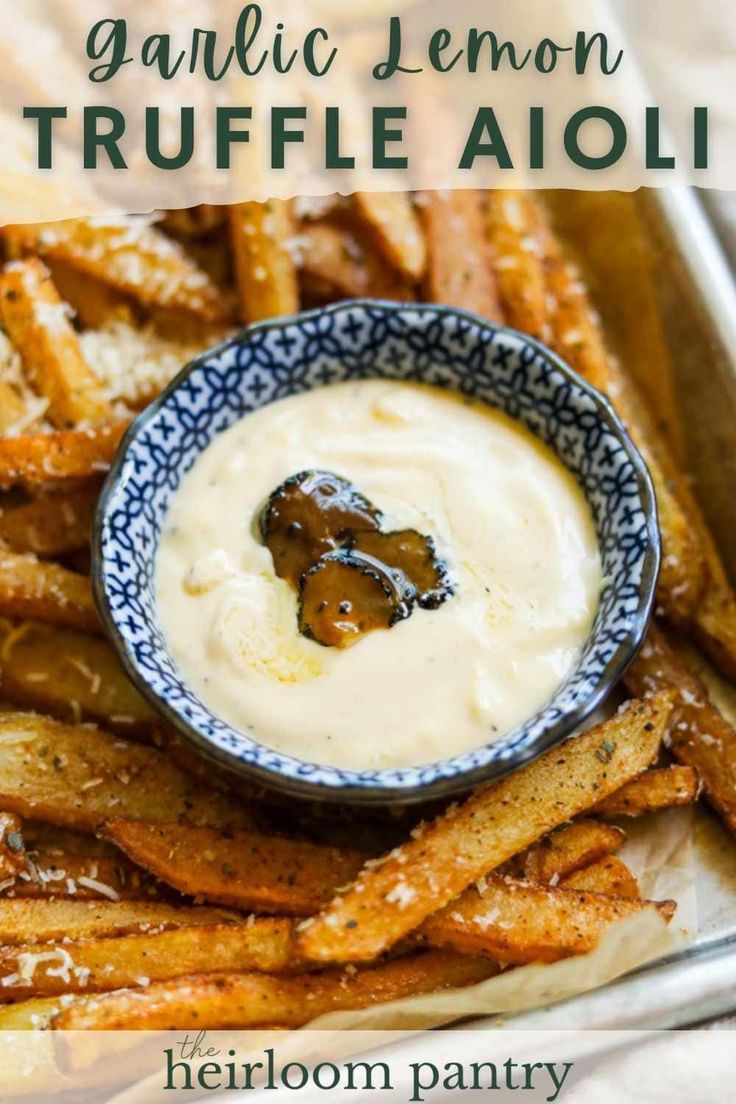 garlic lemon truffle aioli in a blue and white bowl with dipping sauce