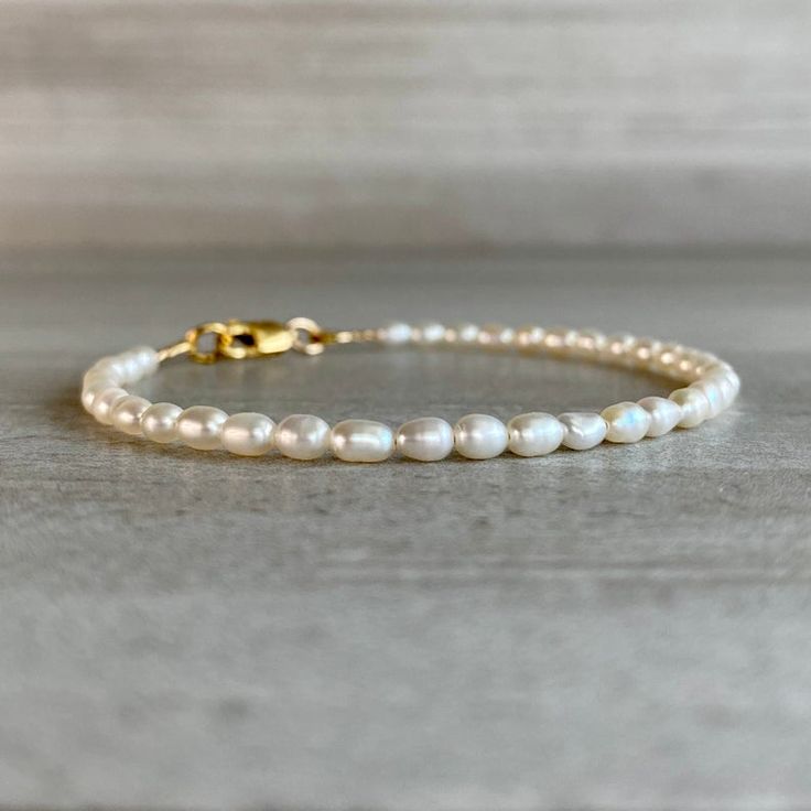 Modern Pearl Jewelry Seed Pearl Bracelet Tiny Pearl | Etsy Elegant White Pearl Bracelet 14k Gold Filled, Classic White Pearl Bracelet With 14k Gold Fill, Elegant White Pearl Bracelet In 14k Gold Filled, Elegant White Beaded 14k Gold Filled Bracelets, Wedding Beaded Bracelets 14k Gold Filled With Round Beads, 14k Gold Filled Round Bead Wedding Bracelets, 14k Gold Filled Round Bead Bracelets For Wedding, 14k Gold Filled Round Beads Bracelet For Wedding, 14k Gold Filled Beaded Wedding Bracelets