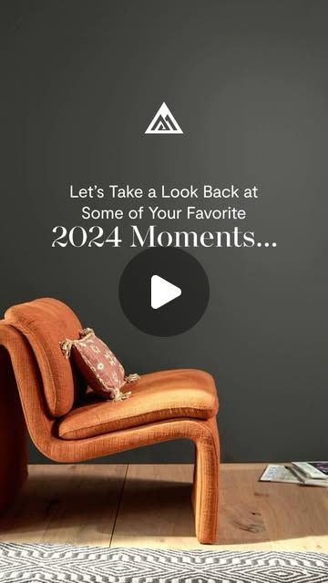 an orange chair sitting on top of a wooden floor next to a wall with the words, let's take a look back at some of your favorite 1204 moments