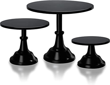 three black tables sitting next to each other