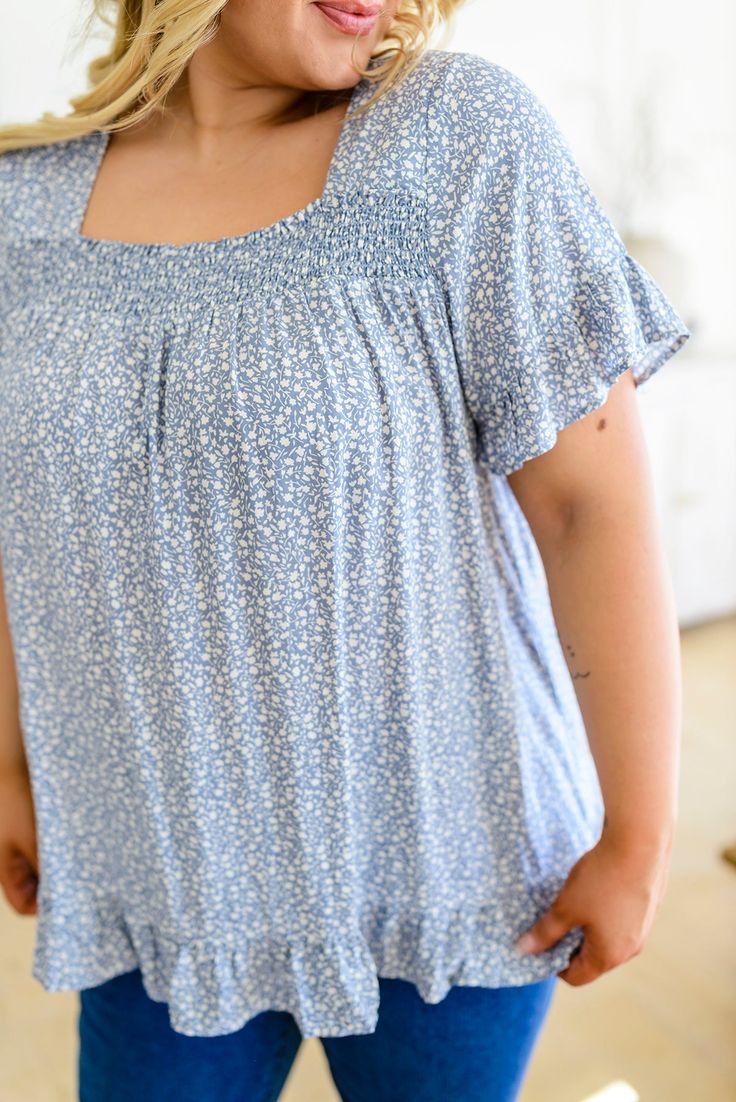 The Sweet Takeaway Top has the cutest details you'll love! Featuring a square neckline that tops a smocked band above the bust, and flowy bodice with ruffle hem that also lines the sleeves. The pastel blue and ditsy floral print creates the perfect girly and summery look! We promise you'll be so happy once this adorable top arrives at your doorstep! Little to no stretch + Lightweight Best with nude undergarments 100% Rayon Wash cold, hang dry True to size, flow fit Measurements listed below are of the actual clothing itemXS: Chest 34" Length 25"S: Chest 36" Length 25"M: Chest 38" Length 26"L: Chest 40" Length 26"XL: Chest 42" Length 27"1XL: Chest 46" Length 29"2XL: Chest 48" Length 29"3XL: Chest 50" Length 30" Model Maddie is wearing size SModel Jordan is wearing size 1XL Denim Fashion Women, Curvy Shorts, Curvy Swimwear, Ditsy Floral Print, Curvy Dress, Cardigan Top, Short Jumpsuit, Overall Dress, Ditsy Floral