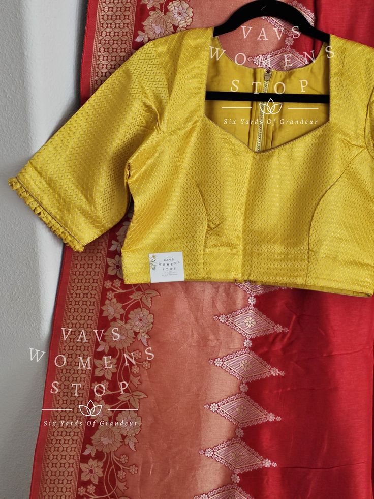 Blouse stitched - Yes Blouse Opening - Back Sleeves Length - Elbow Padded - No Blouse size 38 with inner margins extends to 44 for blouse size 36 alteration can be done on request Fall/pico - Yes done Raw Silk Tops With Traditional Drape, Elegant Cotton Silk Blouse For Traditional Occasions, Yellow Art Silk Blouse With Zari Weaving, Yellow Blouse With Traditional Drape, Transitional Yellow Blouse With Traditional Drape, Elegant Red Cotton Silk Blouse, Traditional Yellow Blouse With Zari Weaving, Yellow Silk Blouse With Traditional Drape, Yellow Blouse With Zari Weaving For Navratri