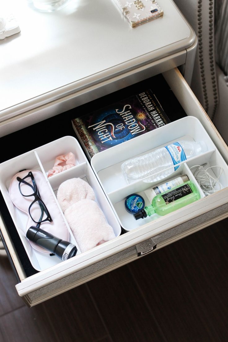 an open drawer with various items in it