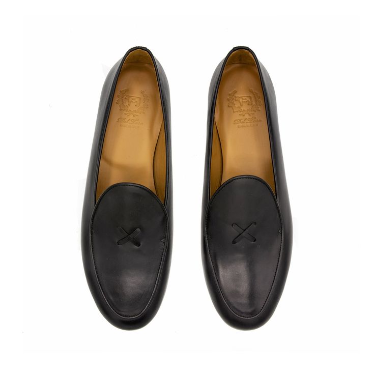 Our Milano Loafer is made with Italian Napa Leather with a custom rubber sole that looks as good as it feels. Handmade in Italy Italian Leather with Red Stitching on Heel Leather Lining and Cushioned Leather Footbed Rubber Sole for Traction and All Day Comfort Size Down A Half Size From Normal Loafer Size Italian Loafers, Tuxedo Shoes, Groom Suits, Men's Wedding Shoes, Black Velvet Bow, 2023 Clothing, Style Capsule, Leather Suspenders, Velvet Slippers