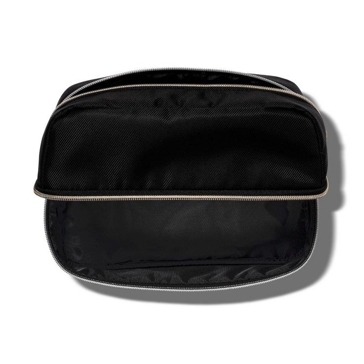 Add functional flair to your cosmetic storage options with this sleek and stylish Toiletry Bag from Sonia Kashuk™. The bold black hue and exposed zippers in a champagne gold tone along the top and side lend a chic, modern vibe to this case. Designed to stand up on its own, it sports a spacious main compartment and a top and middle zipper closure for versatile use. The lightweight recycled polyester construction means it won’t add extra weight in your suitcase or backpack, making it a convenient Modern Travel Cosmetic Bag With Zipper Pocket, Elegant Black Portable Cosmetic Bag, Elegant Portable Black Cosmetic Bag, Luxury Black Bags With Metal Zipper, Black Travel Cosmetic Storage With Zipper Pouch, Black Travel Cosmetic And Toiletry Zipper Pouch, Black Zipper Pouch Case, Black Rectangular Zipper Pouch Case, Black Rectangular Case With Zipper Pouch